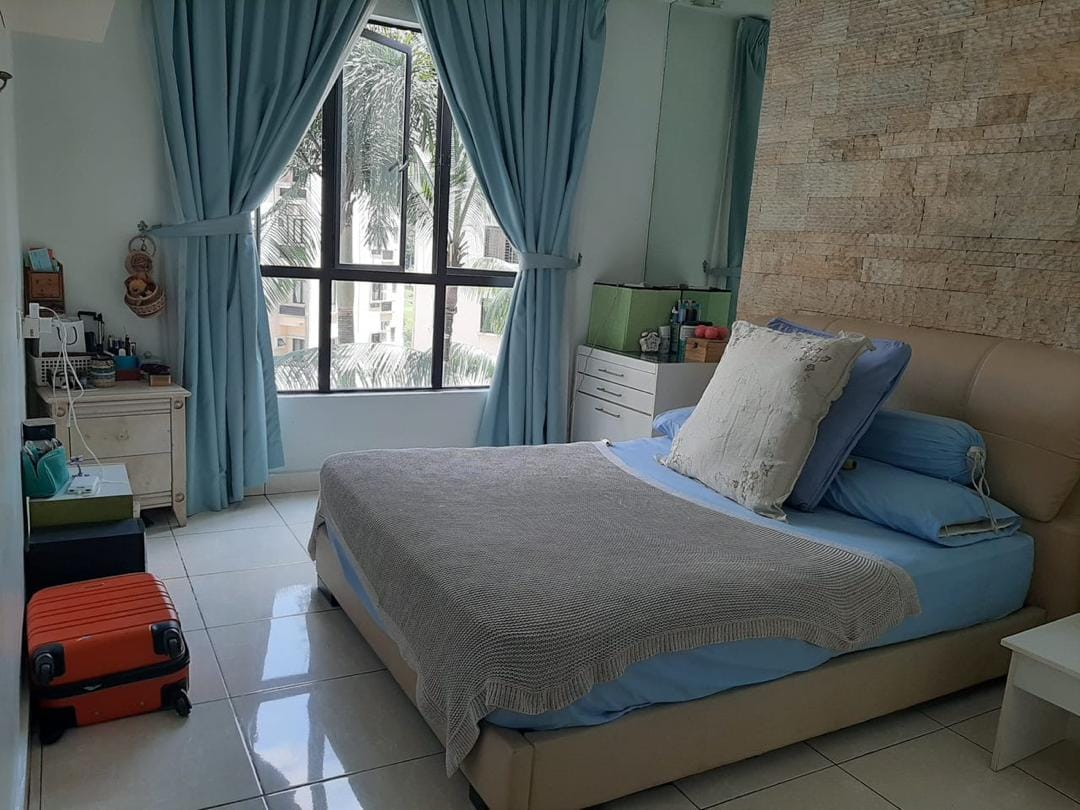 Bedroom with window and natural light at Casa Indah 1